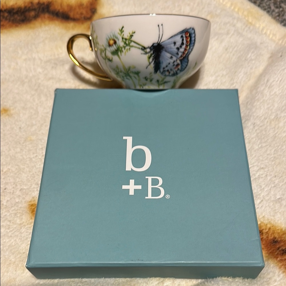 Burton + Burton tea cup. “Wings of Grace”